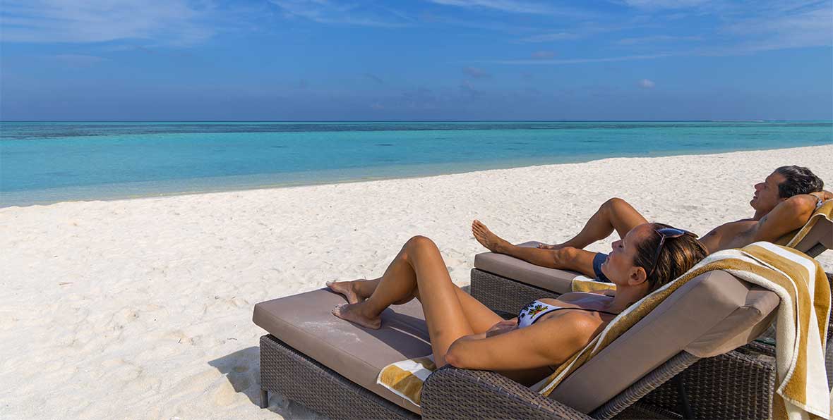 Cocoon Maldives Relaxing On Sunbed - arenatours.com